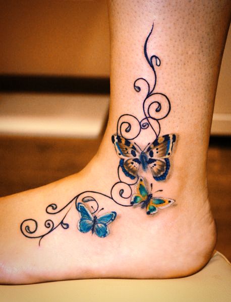Татуировка Бабочки на ноге
